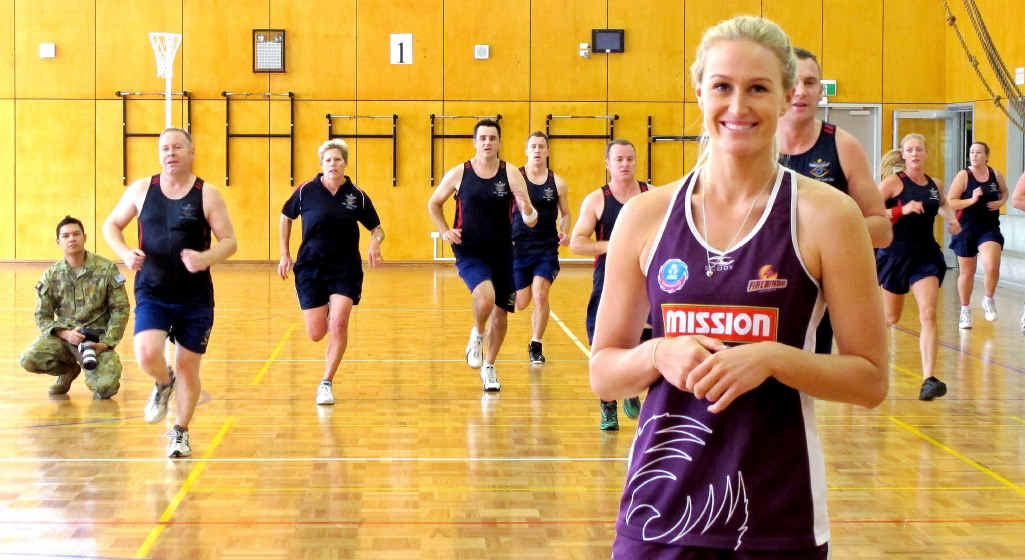 Queensland Firebirds player Chelsea Pitman works with Australian Defence Force teams who have been training in Amberley all week. Queensland Firebirds player Chelsea Pitman works with Australian Defence Force teams who have been training in Amberley all week.